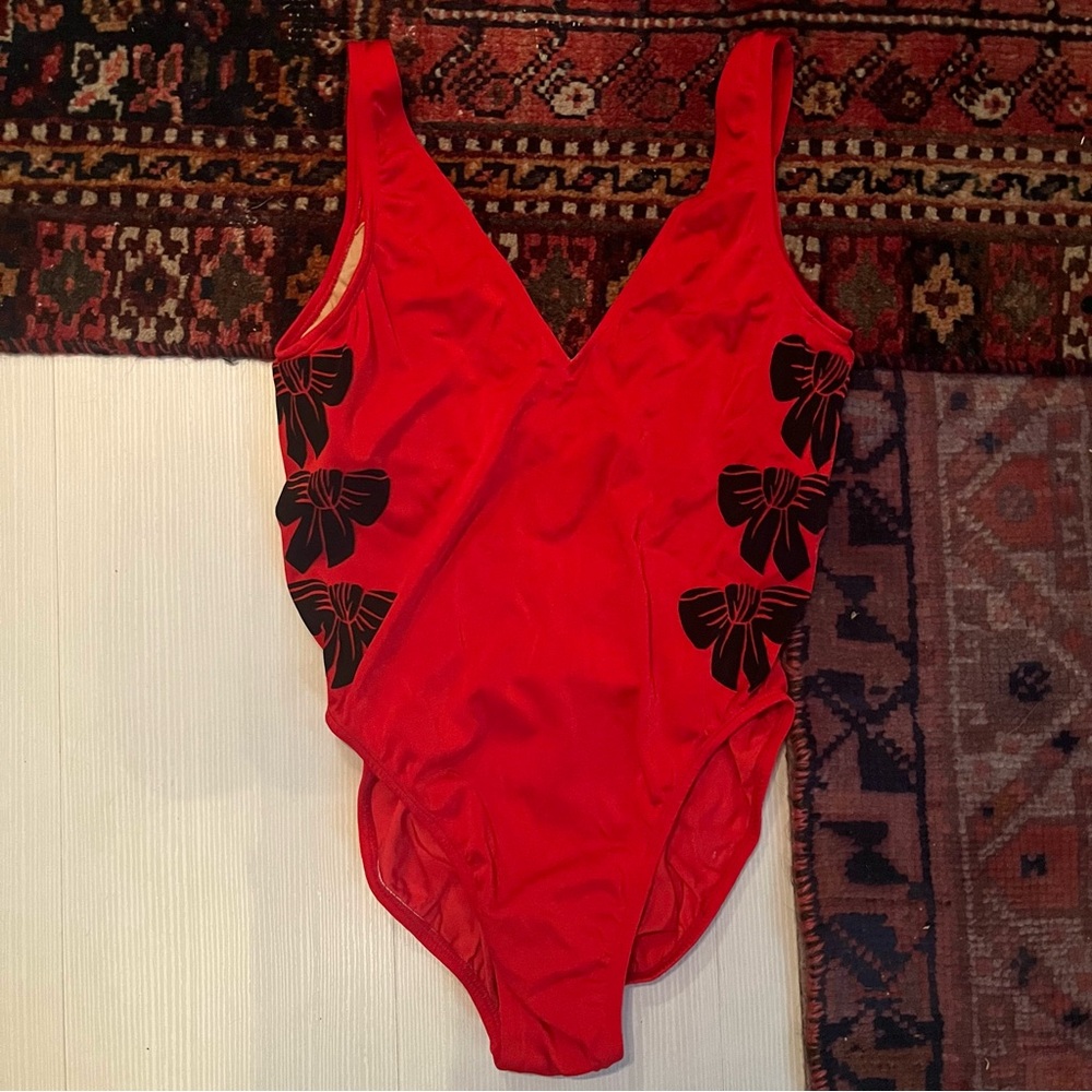 Red one piece vintage swimsuit with bows